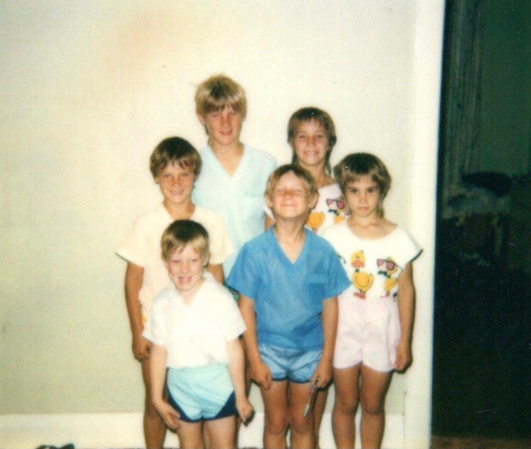 Belle with her four brothers